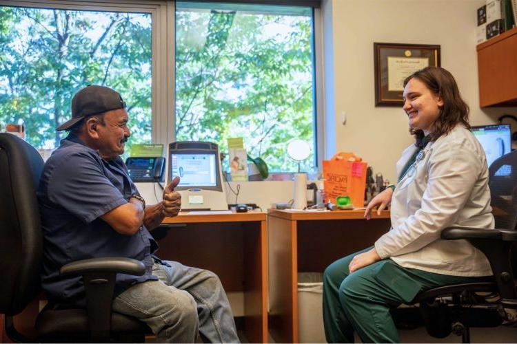 a patient is fitted for hearing aids