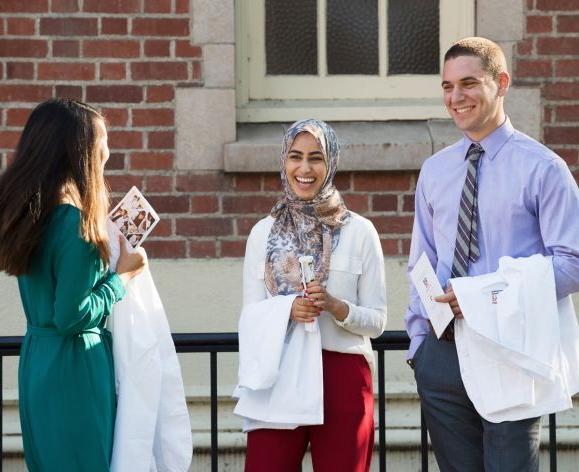 Three PharmD students at White Coat Ceremony